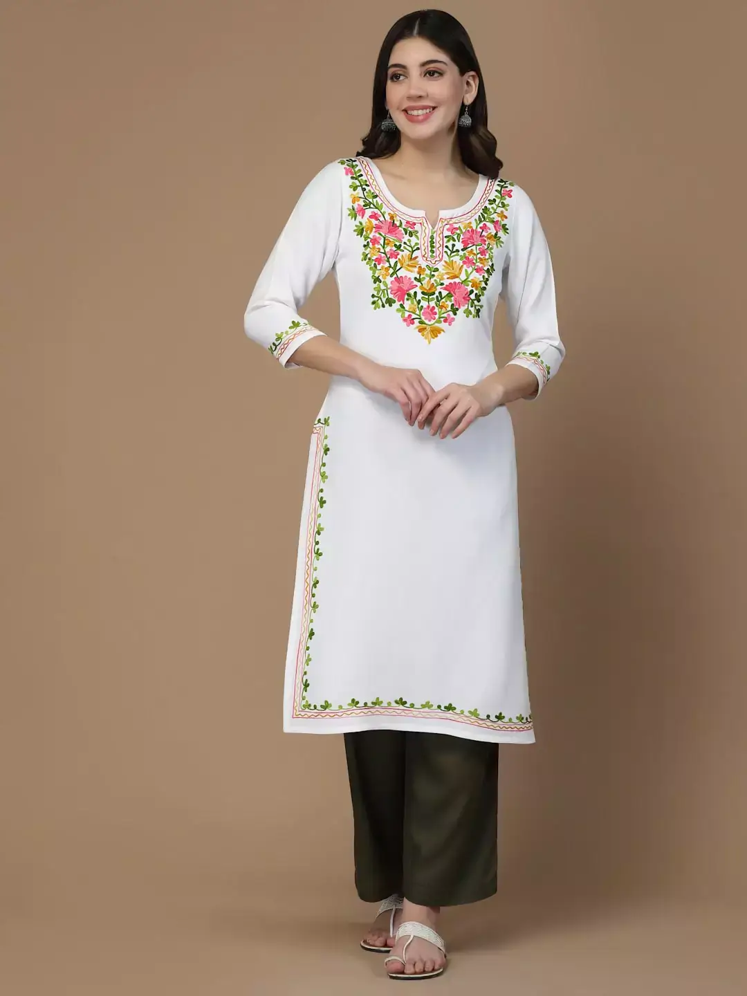 white-multi-aari-long1.webp Aylin White Embroidred Kurti - Image 1